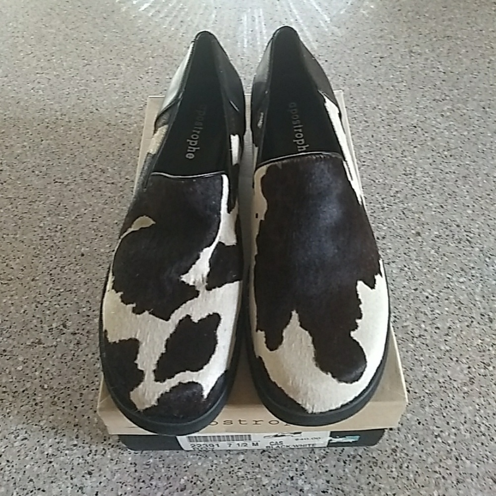 Black/white cow pattern leather shoes
